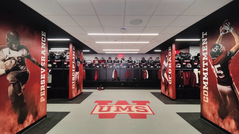 An image of the locker room and its interior signage.